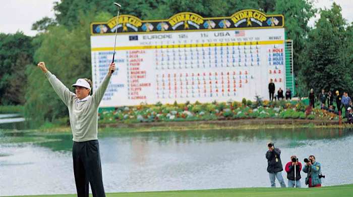 Davis Love III of the USA team celebrates on the 18th after defeating European Costantino Rocca during the 1993 Ryder Cup at the Belfry in Sutton Coldfield in England.